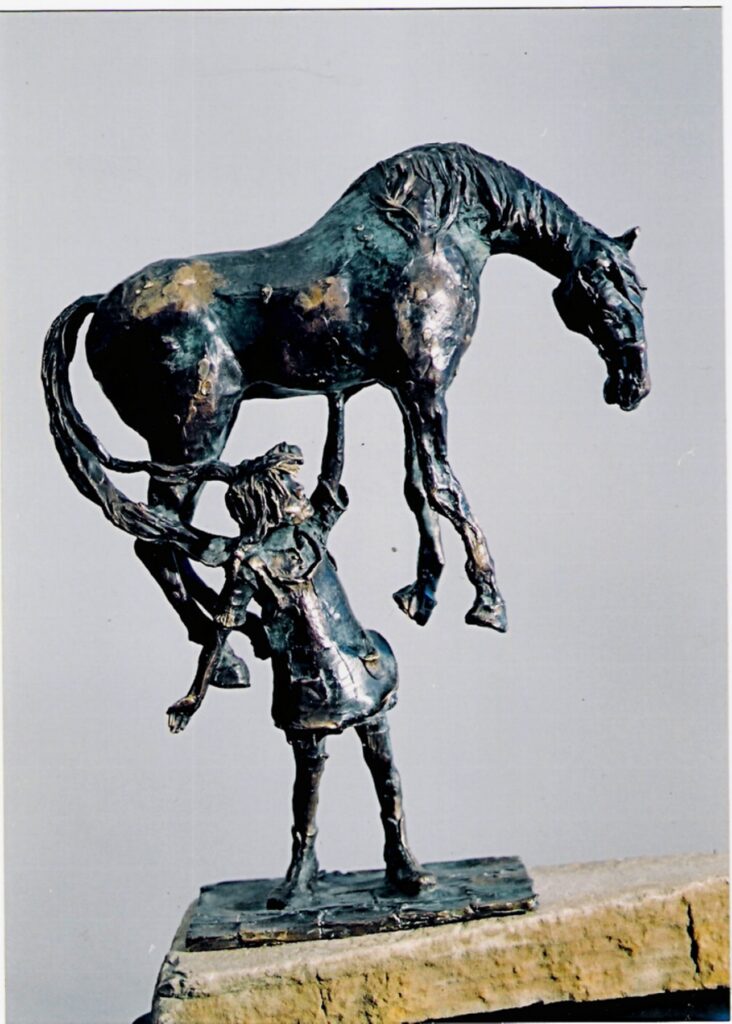 Zdjęcie rzeźby: Pippi podnosi konia